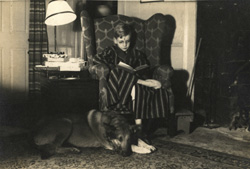 Photo of Broadus Mitchell as a young boy with family dog, N.D. 