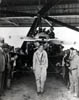 Amelia Earhart with the Beech-Nut Pitcairn PCA-2 Autogiro stopping at Rock Spring, Wyoming in June 1931. Note the man on the right wearing a gun.