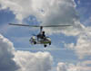 Rick Marshall flying a Snobird autogyro at the PRA Fly-In, Mentone, IN 2000