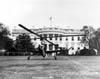 Taking off from the back lawn of the White House just after the awarding of the Collier Trophy at the White House