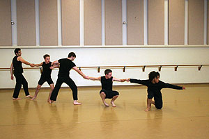 Students rehearse for What Remains, an original dance composition by Gregory Youdan ’07.