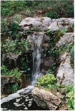 Waterfall filters and recirculates storm water