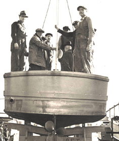 Eight Men in a Hoisted Hull, c. 1930s