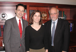 Provost Herman Berliner and President Stuart Rabinowitz congratulate Professor Patricia Welch