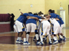 Hofstra huddles during starting lineups