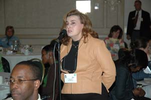 Dr. Sharon Whitton asks a question at NYSED Forum