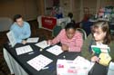 Attendees learning about new products and publications at the vendors' showcase