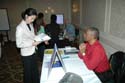 Attendees learning about new products and publications at the vendors' showcase