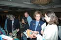 Attendees learning about new products and publications at the vendors' showcase