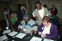 Attendees learning about new products and publications at the vendors' showcase