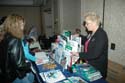 Attendees learning about new products and publications at the vendors' showcase