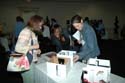 Attendees checking out innovative strategies and students' work at 'Teacher-to-Teacher' Poster Session