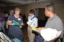 Attendees learning about new products and publications at the vendors' showcase