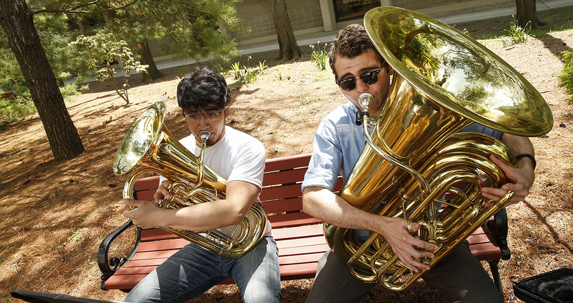 Students playing tubas