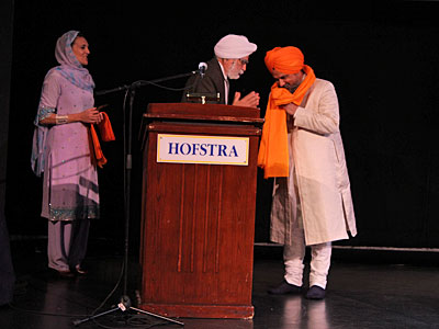 Dr Hakam Singh and Dr. Francesca Cassio felicitating Dr. Gurnam Singh Rathour after his performance at Hofstra University