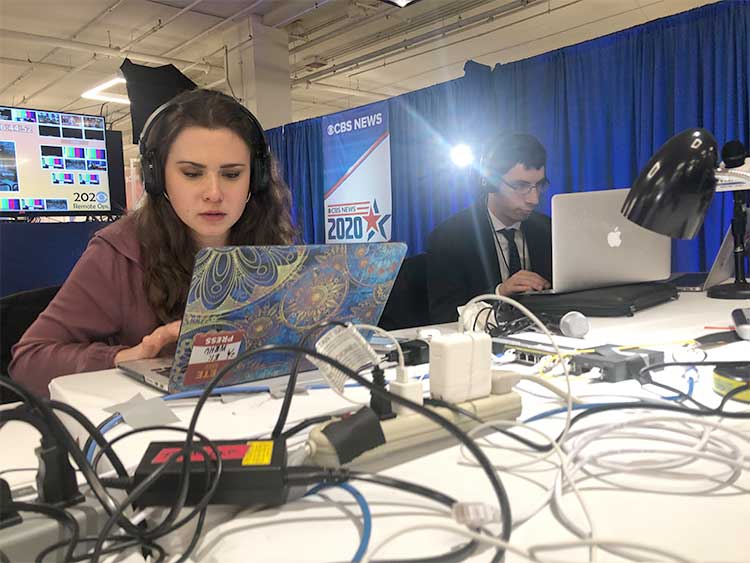 WRHU student news anchors Rachel Luscher & Jason Siegel broadcasting in Manchester NH in the CBS Radio Network filing center during the 2020 NH Primary