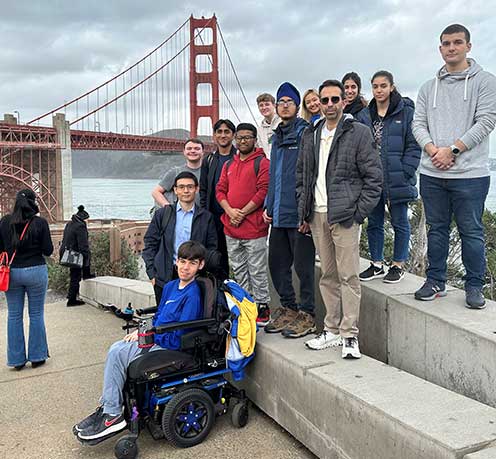 Students standing in front of the Golden Gate Bridge