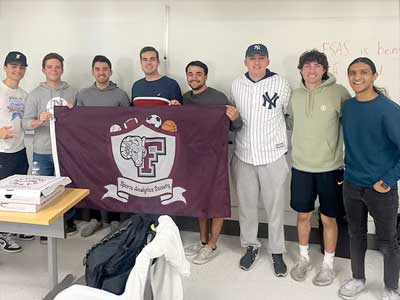 Boys playing basketball in a gym