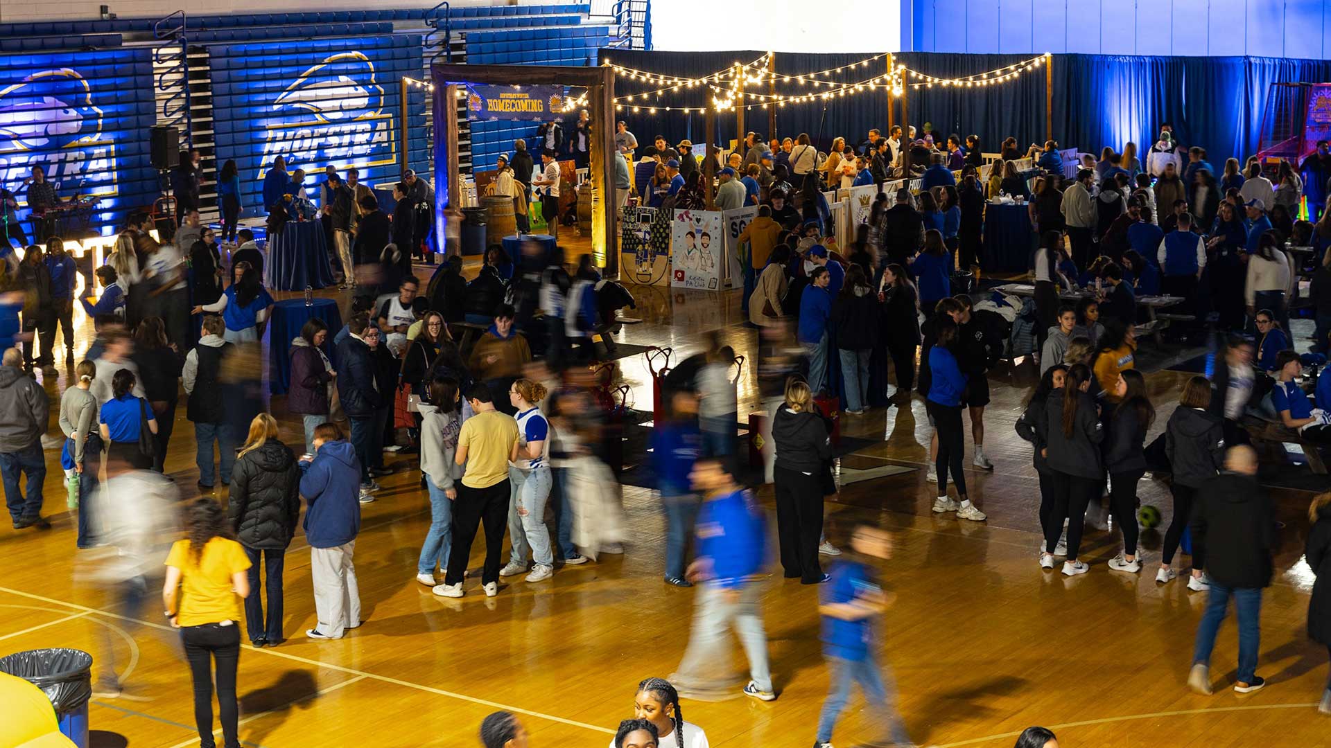 Students at a pregame tail gate event