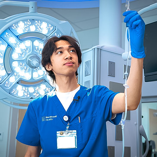 Student using medical training device