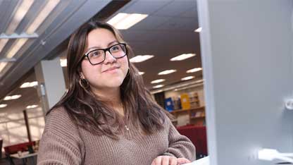 Student with Computer