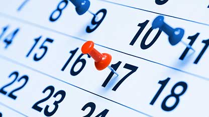 Thumbtack on calendar