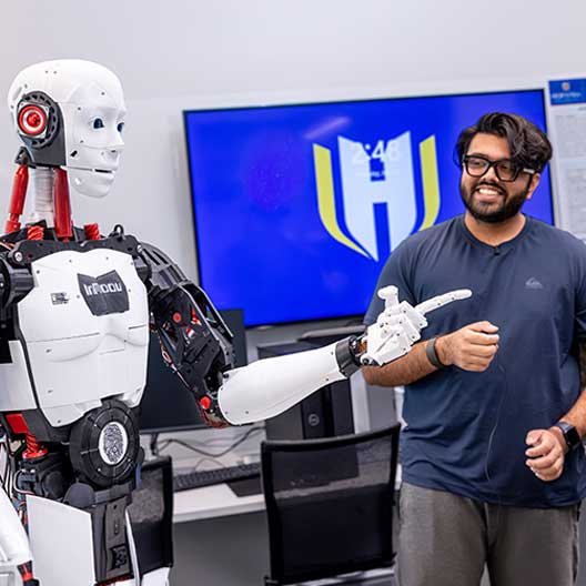 Student working on AI robot